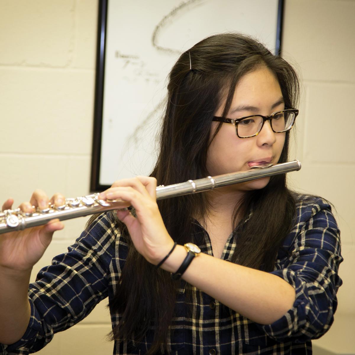 MIC Private Music Lessons - female high school flute player