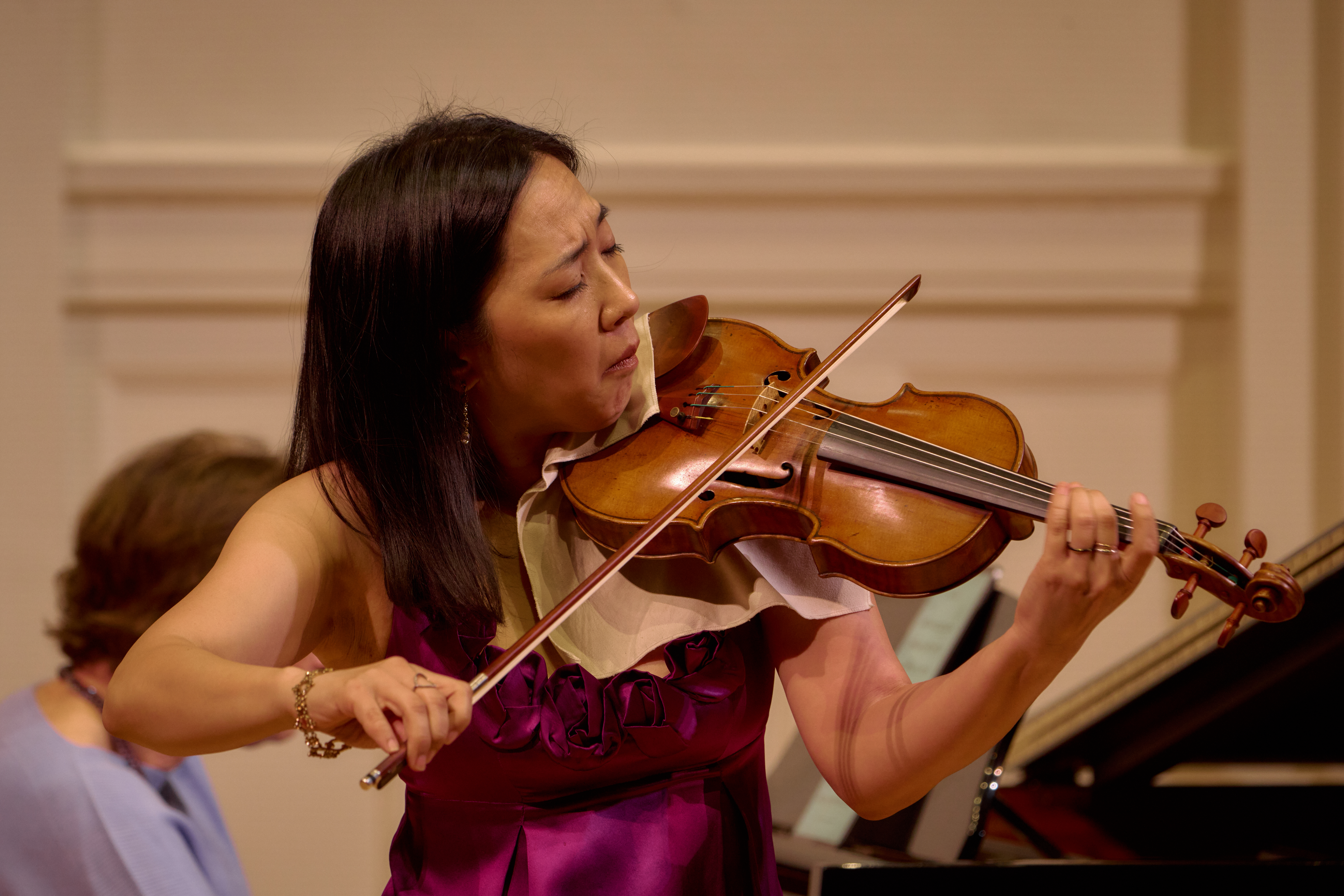 Music Institute faculty violinist Sang Mee Lee performing at the 2025 One Composer, One Community concert honoring Florence Price, photo by Mike Grittani.
