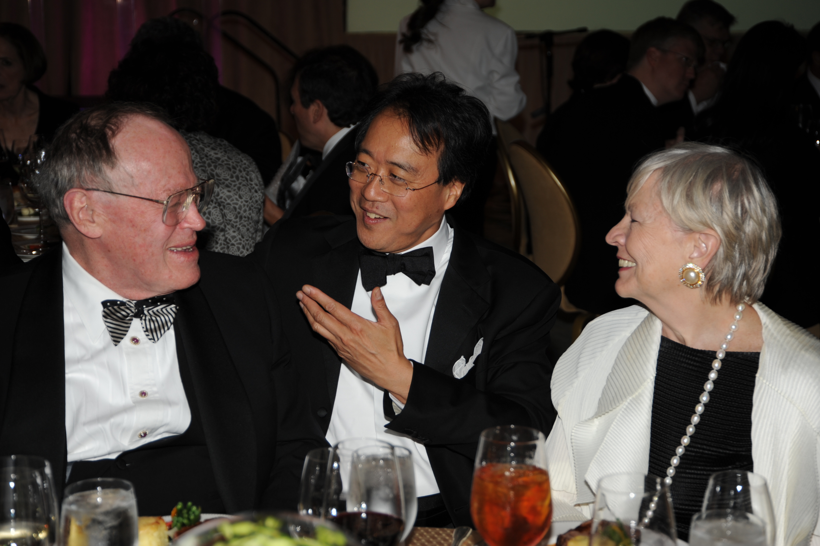 John D. Nichols conversing with Yo Yo Ma and Mrs. Richard M. Daley