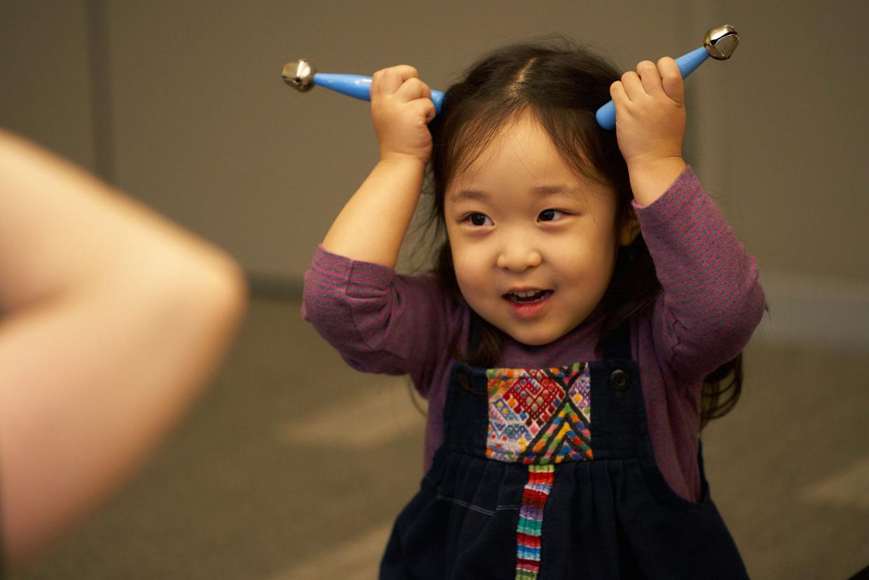 Early childhood Musikgarten toddler with bells